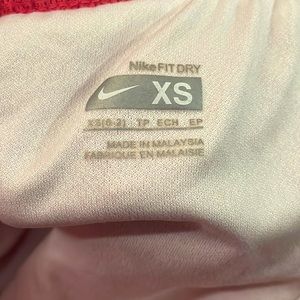 Pink Nike shorts